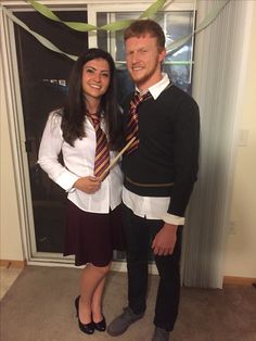 a man and woman dressed up in school uniforms