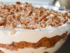 a close up of a dessert in a glass dish