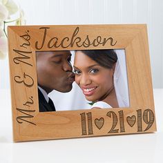 a personalized wooden frame for a newly married couple