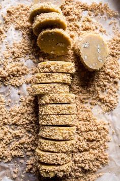 an image of crackers with peanut butter on the top and ground next to them