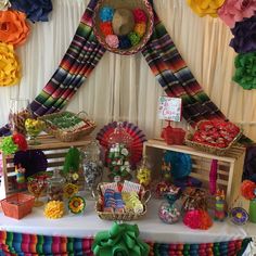 a table topped with lots of colorful items