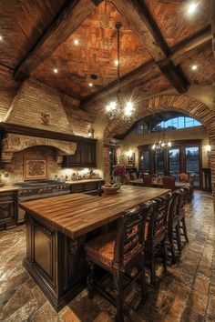 a large kitchen with an island in the middle