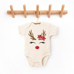 The perfect bodysuit for your perfect baby! These short sleeve bodysuits have 3 snap closure and double needle ribbed binding on neck, shoulders, sleeves, and leg openings. Machine wash cold, inside out. Air dry or tumble dry low. Christmas Onesies, Christmas Girls, Christmas Onesie, One Piece Clothing, Baby Christmas, Short Sleeve Bodysuit, Christmas Girl, Girl Baby, Christmas Baby