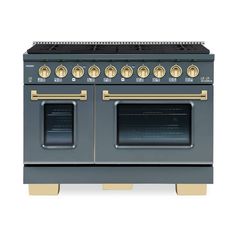 a gray and gold stove with two ovens on it's sides, against a white background