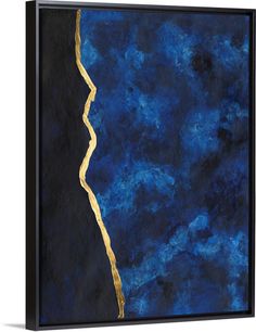 an abstract painting with blue and gold paint on black paper, it looks like the ocean is