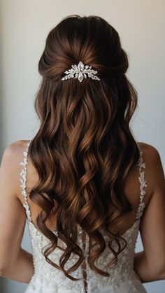 the back of a woman's head wearing a bridal hair comb