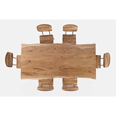 a wooden table that has four chairs on it and one is shaped like a robot