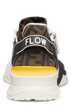 An F-molded rubber sole, logo lettering at the heel and an FF-printed sidewall add to the high-fashion flow of this mixed-media sneaker with a diagonal zip. Elastic laces; side zip closure Removable insole Leather and textile upper and lining/rubber sole Made in Italy Men's Designer Shoes Flow Logo, Mens Designer Shoes, Italian Craftsmanship, Vans High Top Sneaker, Elastic Laces, Vans Sk8, Sports Gifts, Sporty Look, Adele