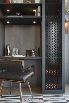 a modern home office with an open shelving unit and leather chair in the foreground