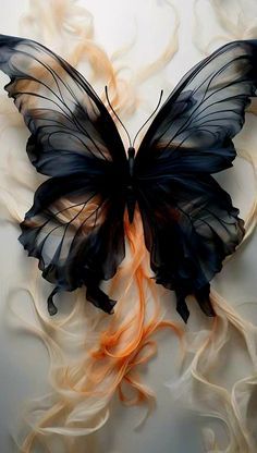 a black and orange butterfly sitting on top of a white sheet with swirls around it