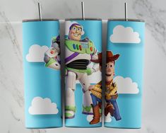 the toy story characters are on blue and white paper towel holders with toothbrushes