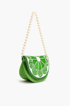 Green Half Moon Shape Handbag Pearl beaded top Handle Embellished front Flap Foldover with Maganetic Closure Lined interiors with zip pocket Size:9.5" x 6" x 3.5" Introducing the Verde Lemon Infusion Shoulder Bag – a stylish and refreshing accessory that adds a pop of color to your ensemble. Crafted in a chic green half-moon shape, this handbag exudes sophistication with a playful twist.Experience luxury and elegance with the pearl-beaded top handle, adding a touch of glamour to your look. The e Martini Outfit, Fruit Bag, Leopard Bag, Farmers Market Bag, Yoga Mat Bag, Mat Bag, Produce Bags, Moon Shape, Beaded Bag