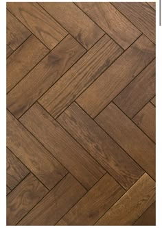 an image of wood flooring that looks like herringbones