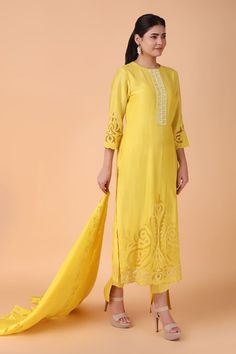 Yellow straight kurta with placement floral cutwork pattern. Paired with a pant and dupatta with floral cutwork pattern. - Aza Fashions Festive Semi-stitched Cutwork Kurta, Fitted Raw Silk Palazzo Set With Chikankari Embroidery, Festive Straight Kurta With Cutwork, Elegant Slub Silk Lawn Suit With Chikankari Embroidery, Cutwork Straight Kurta For Navratri, Straight Kurta With Cutwork For Navratri, Straight Cutwork Kurta For Navratri, Eid Cutwork Straight Kurta, Bollywood Style Tussar Silk Lawn Suit