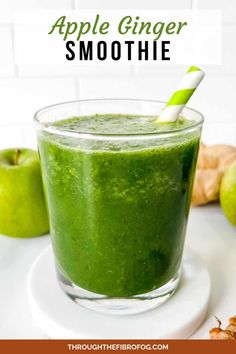 an apple ginger smoothie in a glass with a green straw on top and the title above it