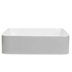 a white rectangular sink on a white background with the bottom section removed from it's side