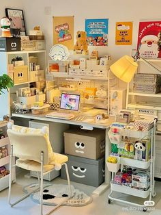 an office with lots of clutter on the desk and shelves full of books, toys