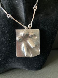 "For sale is a beautiful and substantial modernist necklace in silver by Matti Hyvärinen (Finland). The design is called \"Frost Flower\" and was realized by Sirokoru Ltd. in 1966. It bears the following marks: MJH (for Matti Hyvärinen) Crown mark 925H Turku city mark 830 for silver purity S7 for 1971 The chain is integral to the pendant and features no closure - it is long enough to slip over the head. Chain length is ~60 cm. The pendant measures 5cm x 4cm. Weight is just under 46 grams. In exc Brutalist Sterling Silver Pendant Necklace, Sterling Silver Brutalist Necklace For Gift, Modern Sterling Silver Necklace For Collectors, Silver Brutalist Necklace As Gift, Hand Cast Modernist Jewelry For Gifts, Modernist Hand Cast Jewelry As Gift, Silver Brutalist Necklace For Gift, Brutalist Silver Necklace For Gift, Modernist Hand-cast Jewelry For Gifts