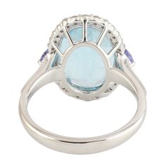 an oval blue topazte and diamond ring