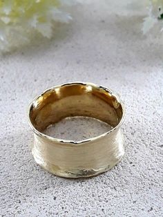 SPIRA Unique Handcrafted Wide Hammered Wedding Ring Solid 9/14 Karat Yellow Gold Brush Finish, Statement Ring, Unique Bohemian unisex ring R-0134-YG Metal Purity: 9k / 14k Style: Wedding Width mm: 9.5 Free Shipping: US & CA: 5-7 days UK: 2-3 days Europe: 4-8 days Australia: 10 days Expedited shipping options are also available during checkout process Hand Forged Brass Rings For Wedding, Heirloom Brass Wedding Ring, Heirloom Yellow Gold Wide Band Ring For Wedding, Heirloom Yellow Gold Wide Band Wedding Ring, Wedding Jewelry Wide Band Hand Forged, Hammered Open Band Wedding Jewelry, Fusion Style Gold Wedding Rings, Heirloom Wide Band Wedding Ring, Gold Fusion Wedding Rings