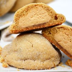 three cookies stacked on top of each other with one cookie in the middle and another behind them