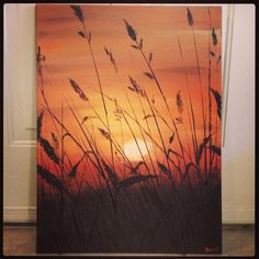 a painting of grass in front of a sunset