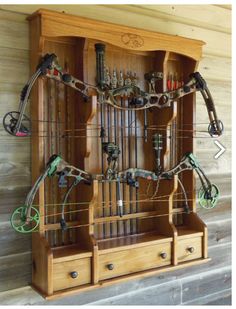 an old wooden cabinet with lots of wires attached to it