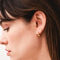 Elevate your ear stack with our Tapered Huggies. These not-too-big, not-too-small earrings boast a sleek and contemporary design, featuring a tapered silhouette that effortlessly hugs your earlobe. Crafted with precision from gold-filled material, these huggies offer a timeless blend of style and comfort, making them the perfect accessory for both the everyday as well as holidays and special occasions. Gift Cards & Certificates, Burlap Bags, Ear Stack, Decorative Blankets, Small Earrings, Free Gift Wrapping, Pottery Mugs, Huggies Earrings, Sale Items