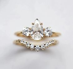 an engagement ring set with a pear shaped diamond