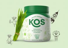 a jar of kos organic wheatgrass powder next to a bunch of green onions