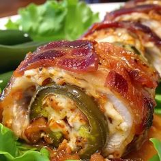 a close up of food on a plate with lettuce