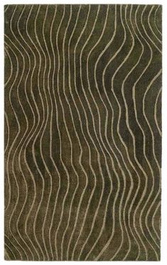 an area rug with wavy lines on the side and dark green, beige, and white colors