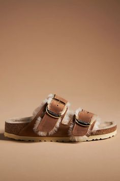 Birkenstock Arizona Big Buckle Shearling Sandals | Anthropologie Birkenstock Shearling, Shearling Sandals, Birkenstock Arizona Big Buckle, Arizona Big Buckle, Solid Socks, Birkenstock Arizona, Brown Sandals, Nubuck Leather, Black Fits