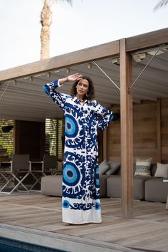 The perfect house dress for lounging or having a coffee in your backyard on a beautiful morning, all while looking beautiful and feeling comfortable at the same time.  This Kaftan is ideal to wear for any casual occasion. Whether taking a trip down the shopping lane, or home-based kitty parties, or about anything else, wearing this dress will make you feel classy and comfortable. Fabric : 100% Polyester Size : This Kaftan comes in two sizes. One size that fits from a Small to Large (Size 14 US) Printed Tunic Maxi Dress, Maxi Length Abaya As Beach Cover-up, Flowy Abaya For Vacation, Blue Maxi Length Abaya For The Beach, Blue Maxi Length Thobe For Vacation, Maxi Length Abaya For Beach Cover-up, Blue Abaya For Vacation, Summer Kaftan, Kitty Party