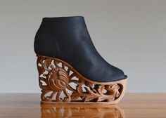 Designer LanVy Nguyen explores the beauty of ancient Vietnamese wood art to create beautiful modern shoes Weird Fashion Trending, Mode Shoes, Dr Shoes, Funky Shoes, Platform Wedge Heels, Modern Shoes, Wooden Heel, Unique Shoes