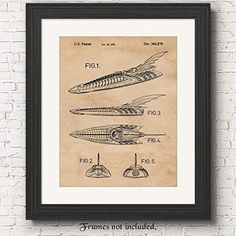 an old fashioned drawing of a flying boat and a propeller on a brick wall with black frame