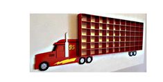 a red truck shaped like a bookcase hanging from the side of a white wall