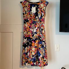 Fun Floral Dress With Twist Waist Feature. Soft And Slight Stretch For Comfort. Machine Washable. Smoke Free Home. Make An Offer! Casual Sheath Dress With Floral Print, Casual Floral Print Sheath Dress, Multicolor Floral Print Fit And Flare Dress, Multicolor Knee-length Floral Dress, Chic Multicolor Knee-length Floral Dress, White Sheath Dress, Womens Sheath Dress, Asymmetrical Hem Dress, Grey Sweater Dress