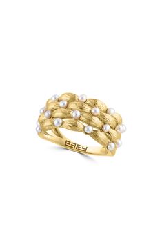 A polished 14-karat yellow-gold ring showcases pillowy, textural bands dotted with dainty freshwater pearls for elegant shine. 3/8" band width Pearl size: 2mm 14k gold/freshwater pearl Made in the USA Pearl Ring Band, Pearl Eternity Band, Pearl Wedding Band, Pearl Wedding Bands, Multi Band Ring, Ring Stack, Keep Jewelry, Pearl Size, Ring Band