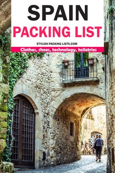 an old stone building with the words spain packing list on it's front cover