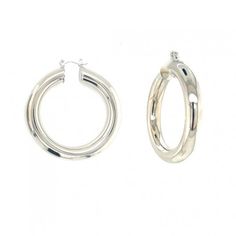 Crafted with meticulous attention to detail, these hoops showcase a generous size and a chunky design that commands attention. Embrace the bold and striking allure of the large chunky silver-plated hoops, adding a touch of modern elegance and self-assured style to your accessory collection. Hoop Size: 7.5mm x 45mm Tiny Studs, Beads Jewelry, Silver Hoops, Jewelry Pouch, Modern Elegance, Touch Of Modern, Silver Plate, Silver Plated, Size 7