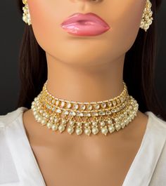 White Pacchi Kundan Pearl Necklace, Indian Punjabi Pakistani wedding necklace Jewelry, Bridal Jewelry Pacchi Kundan Necklace Set /Kundan Choker / Bollywood Jewelry / Indian jewelry /Pakistani necklace/bridal necklace/indian wedding /choker This is 100% Handmade jewelry. So Color, shades, texture displayed may slightly vary from the actual product due to digital image limitations. We request you to consider these minor variations. Please expect the possibility of some slight imperfections when bu White Bridal Necklace For Marriage Festivals, Festive White Bridal Necklace For Marriage, White Kundan Necklaces For Marriage, Gold Choker Jewelry Set For Reception, White Tilla Choker For Wedding, White Festive Necklace For Marriage, Festive White Necklace For Marriage, Festive White Wedding Necklace, Chandbali Pearl Jewelry For Wedding