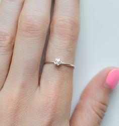 This elegant and timeless rose ring is a must-have for any jewelry collection. Made of high-quality sterling silver, this simple and dainty flower ring is perfect for women who appreciate delicate and feminine designs. Its subtle beauty makes it a versatile accessory that can be worn on any occasion, adding a touch of sophistication to any outfit. Shop now to add this exquisite piece to your collection. Rings are only sold in sizes 5 6 7 8 9 10  PRODUCT DETAILS * Ring is solid 925 sterling silve Nature Inspired Rings, Rose Ring, Zierlicher Ring, Detailed Ring, Gold Ring Stack, Feminine Design, Delicate Rings, Flower Ring, Silver Band