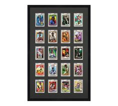 a black framed display with many different stamps on the front and back of each stamp