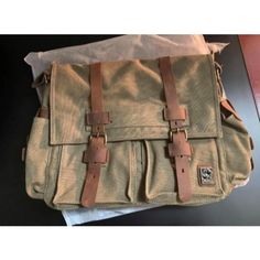 Main Material: Use Of High-Quality Cotton Canvas, High-Quality Imported First Layer Of Leather And Bronze Metal Structure: A Total Of Six Pockets, One Main Pocket, Outside There Are: Two Front Pockets, A Zippered Back Pocket; Inside: A Zipper Pocket, Dimensions:' You Can Put 15-Inch Laptop Capacity: 10l Weight: 1 Kg2.2lb Features: Design Retro Minimalist Design, With Thick Shoulder Strap Handle, More Comfortable This Bag Will Meet All Your Requirements, And It Look Absolutely Perfect. You Will L Casual Everyday Carry Rectangular Bag, Casual Rectangular Everyday Carry Bags, Everyday Use Khaki Leather Bag, Large Capacity Leather Bag In Khaki, Large Capacity Khaki Leather Bag, Everyday Use Large Capacity Flap Satchel, Khaki Leather Bag With Removable Pouch, Khaki Leather Bag With Adjustable Strap, Everyday Carry Large Capacity Rectangular Satchel