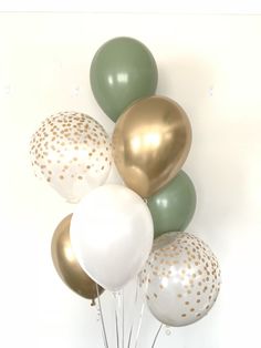 a bunch of balloons that are in the air