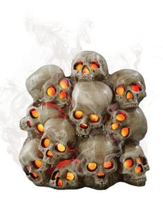 a pile of skulls with glowing orange eyes