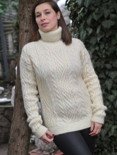 Winter White High Neck Sweater, White Chunky Knit Turtleneck For Winter, Cream Chunky Knit Turtleneck Sweater, Cream Knitted High Neck Sweater, Winter White Knitted Turtleneck Sweater, Knitted Turtleneck Sweater In Winter White, White Knitted Turtleneck For Winter, White Knitted High Neck Sweater, Elegant Knitted Sweater For Winter