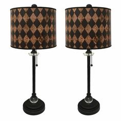 a pair of lamps with black and brown shades