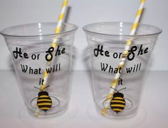 two plastic cups with yellow and white straws in the shape of a honeybee